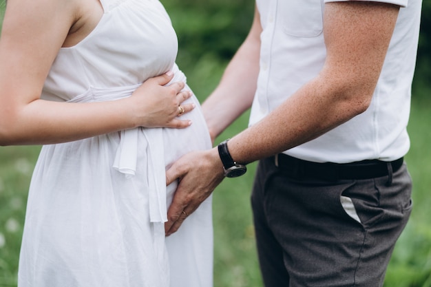 Free Photo | The husband embarcing wife's stomach