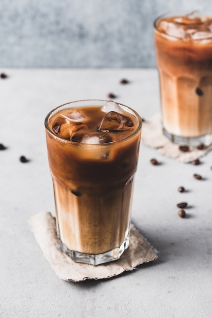 Premium Photo | Ice coffee with milk background