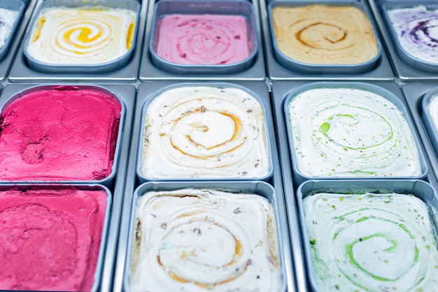 Premium Photo | Ice cream bar. ice cream in containers close up