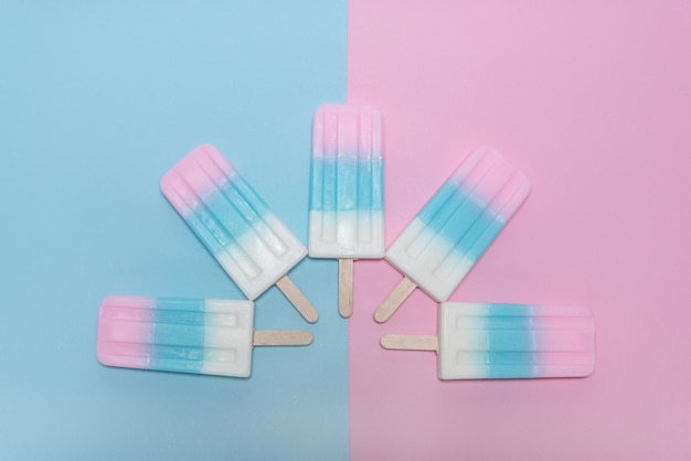  Ice  cream  over blue and pink  background  Free Photo