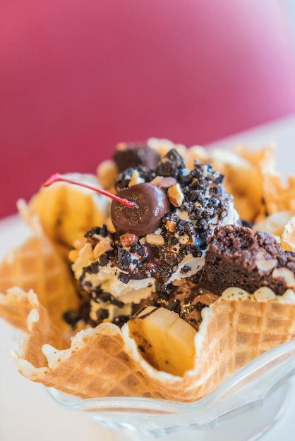 Free Photo | Ice cream sundae in an edible waffle bowl