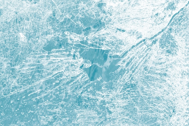 青い壁紙に撮影された氷の表面テクスチャマクロ 無料の写真