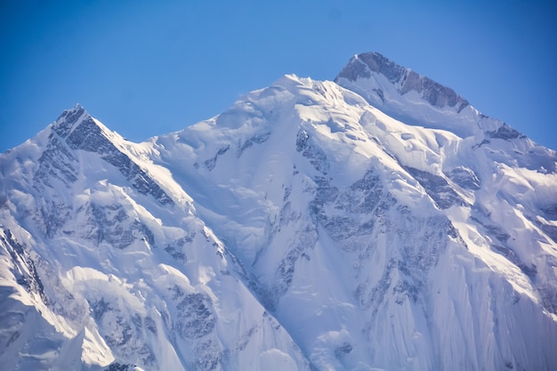 Premium Photo | Ice terrain covers the rakaposhi peaks. it is a high ...