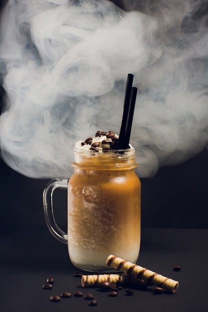 Premium Photo | Iced caramel latte coffee in tall glass with syrup and ...