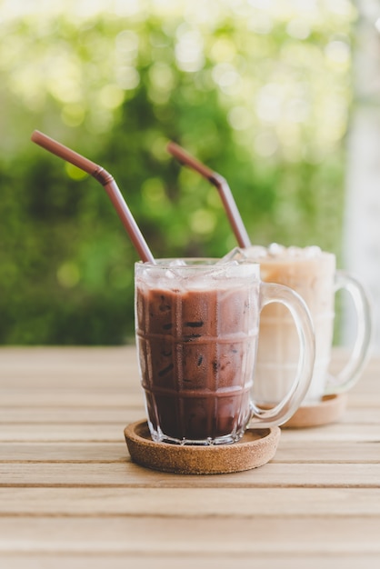 Premium Photo | Iced chocolate and iced coffee latte