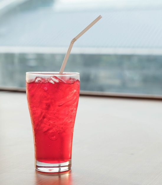 Download Free Photo | Iced red soda glass