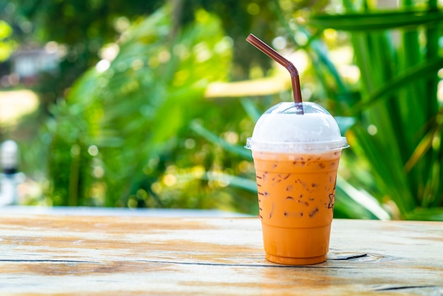Premium Photo | Iced thai milk tea cup