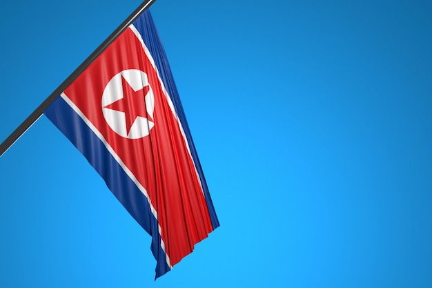 青い空に羽ばたく金属の旗竿に北朝鮮の国旗のイラスト プレミアム写真