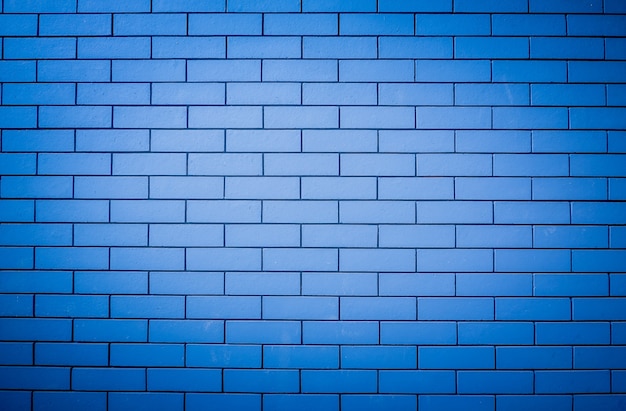 Premium Photo | The image of a blue brick wall for use as a background