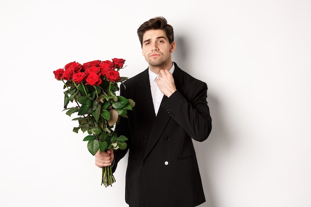 premium-photo-image-of-elegant-and-sassy-man-in-black-suit-looking