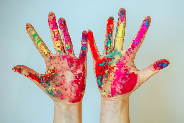 Premium Photo | Image of women's hands, concept of holi, indian ...