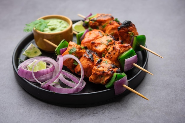 Premium Photo | Indian chicken tikka kebabs, marinated in spices and ...