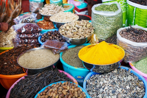 Premium Photo | Indian colored spices at local market. a variety of ...