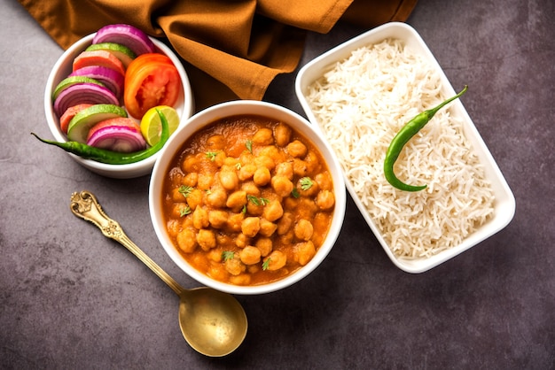 Premium Photo | Indian food chole chawal or spicy chickpea curry with ...