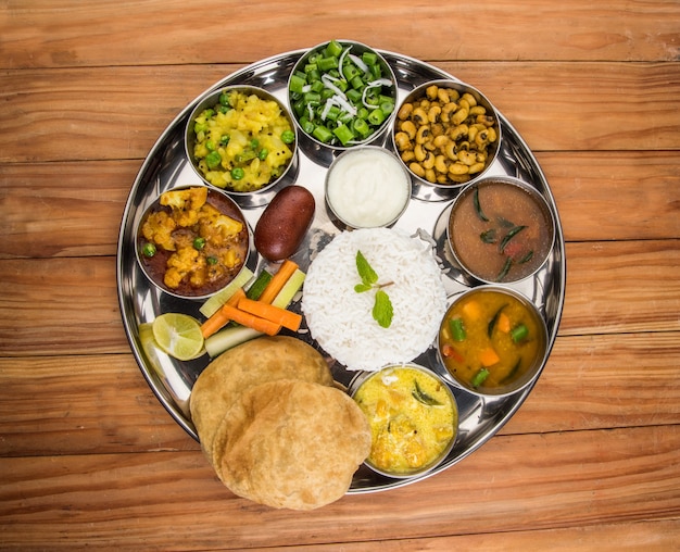 Premium Photo | Indian or hindu veg thali also known as food platter is ...