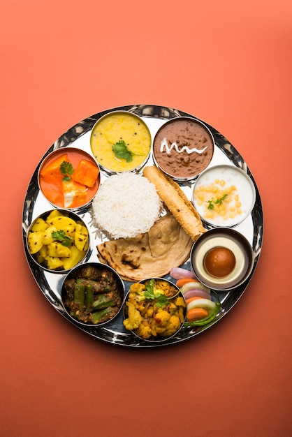 Premium Photo | Indian hindu veg thali or food platter, selective focus