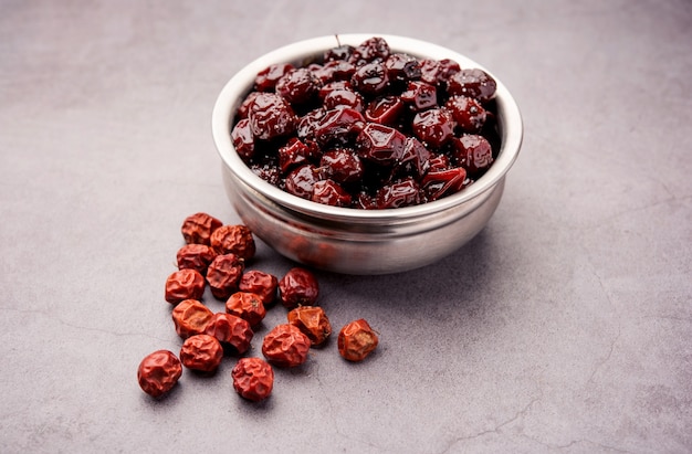 Premium Photo | Indian jujube, berry or ber boiled in jaggery syrup ...