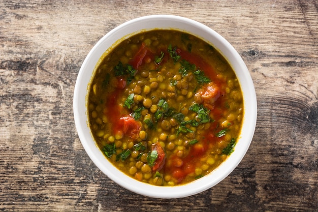 Premium Photo | Indian lentil soup dal (dhal) in a bowl on wooden table. t