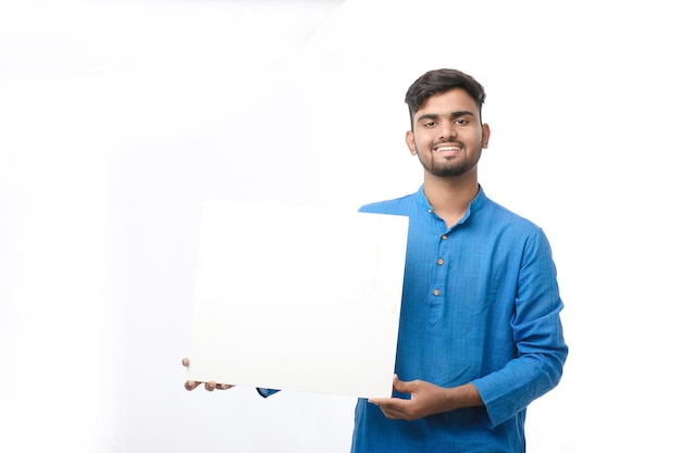 Premium Photo | Indian man wearing traditional cloths and showing board ...