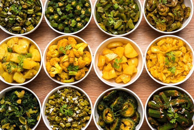Premium Photo | Indian sabzi, vegetable fried recipes served in white ...