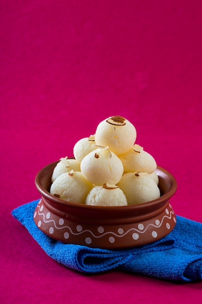 Premium Photo | Indian sweet - rasgulla, famous bengali sweet in clay ...