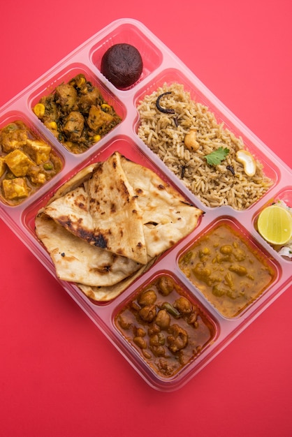 Premium Photo | Indian vegetarian thali or food platter for parcel or ...