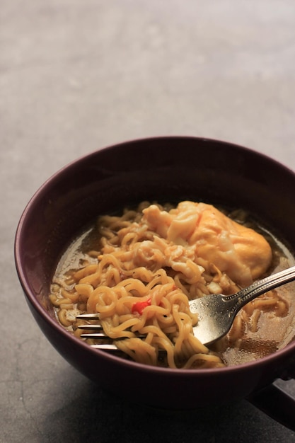 Premium Photo | Indonesian Instant Noodles (junk Food) With Cut Chillies