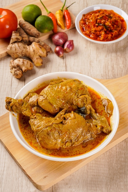 Premium Photo | Indonesian traditional cuisine ayam gulai padang ayam ...