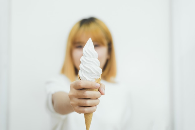 Free Photo Indoor Portrait Of Young Beautiful Asian Woman Eating Ice Cream In Summer