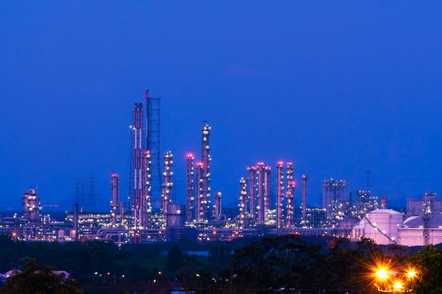 Premium Photo | Industrial factory in the night time.