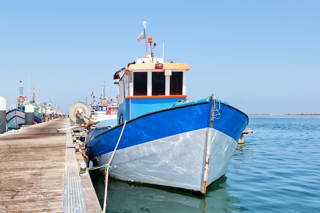 Premium Photo | Industrial fishing boat in the harbor.