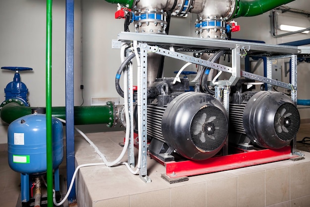 Premium Photo | Industrial interior water pump, valves, pressure gauges, motors inside engine room. valve and pumps in an industrial urban modern powerful pipelines and pumps, control systems