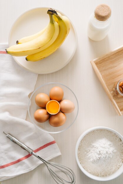 Premium Photo | Ingredients And Tools To Make A Cake, Flour, Butter ...