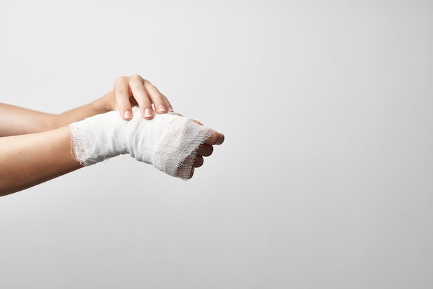 Premium Photo | Injured arm bandaged medicine traumatology
