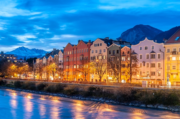 Premium Photo | Innsbruck austria colorful houses by the river at dusk