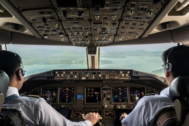 Premium Photo | Inside cockpit of commercial airplane while fly