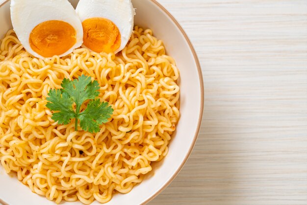 Premium Photo | Instant noodles bowl with boiled eggs