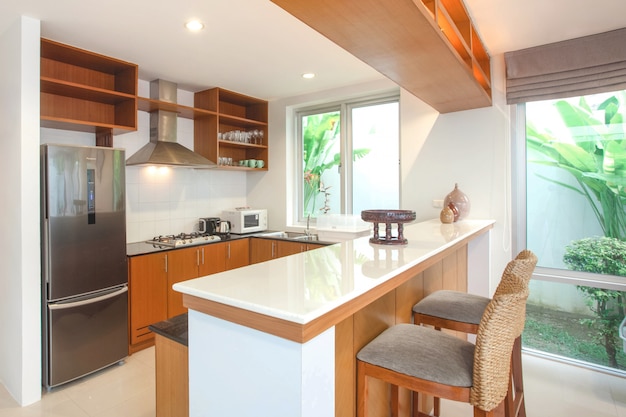 Premium Photo | Interior design in kitchen area which feature island