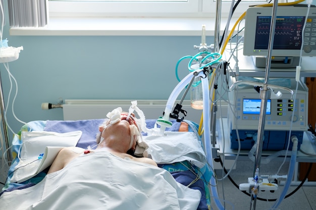 Premium Photo Intubated Adult White Man Under Avl Lying In Coma In