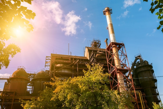 Premium Photo | Iron smelter factory in the rays of the evening sun