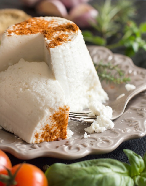 Premium Photo | Italian ricotta cheese, vegetables and herbs close up