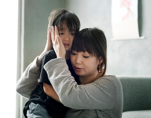 Premium Photo | Japanese mother comforting her daughter
