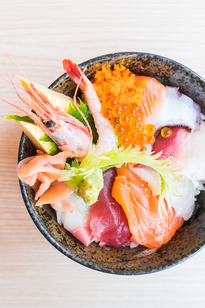 Free Photo | Japanese rice bowl with sashimi seafood on top