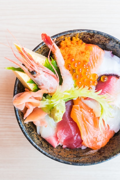 Free Photo | Japanese rice bowl with sashimi seafood on top