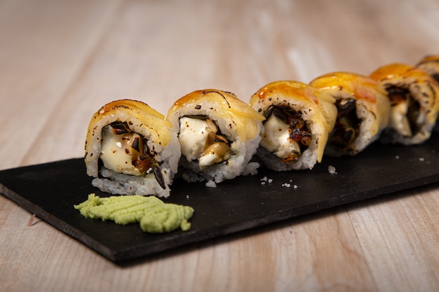 Premium Photo | Japanese sushi, goat cheese urimaki and apple. isolated ...