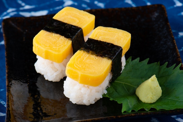 Japanese sweet egg sushi. Premium Photo