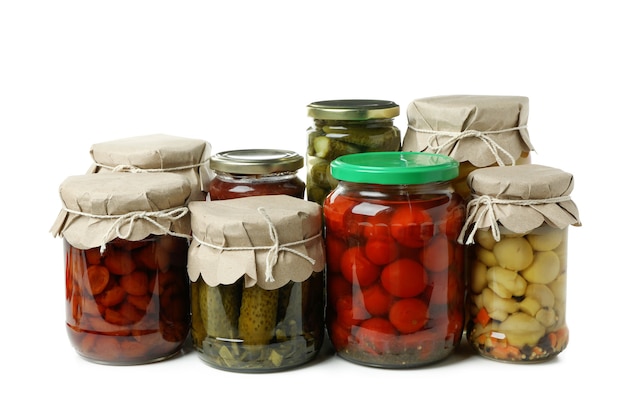 Premium Photo | Jars of pickled vegetables isolated on white background