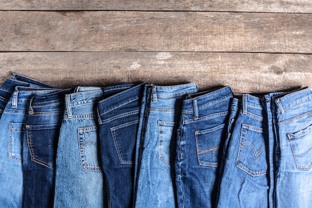 Jeans on wooden Photo | Premium Download