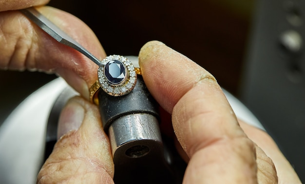 Premium Photo | Jewelry Production. The Process Of Fixing Stones