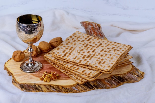 Premium Photo | A jewish matzah bread with wine. passover holiday concept